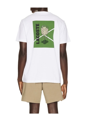 Lacoste T-Shirt in White. Size 3. Also in 4, 6, 5, 7.