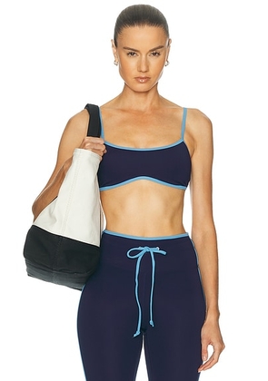 YEAR OF OURS Sport Monica Bra in Midnite Sport Blue - Navy. Size M (also in XS, S, L).