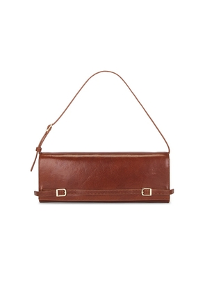 SIMKHAI River East West Vachetta Leather Clutch in Cognac.