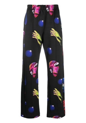 COUNTY OF MILAN Crazy Faces print track pants - Black