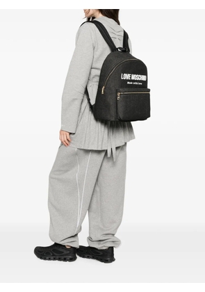 Love Moschino logo-patch denim backpack - Black