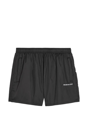 MKI Miyuki Zoku logo-print swim shorts - Black