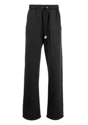 Off-White eyelet-embellished track pants - Black