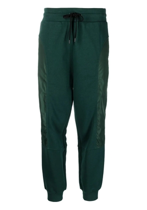 Love Moschino panelled logo-print track pants - Green