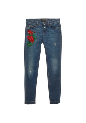 Dolce & Gabbana Pre-Owned floral-applique skinny jeans - Blue