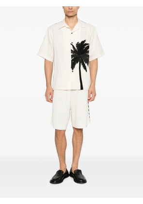 COMMAS palm-embroidered shirt - Neutrals