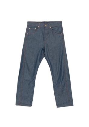 Moschino contrast-stitch logo-patch jeans - Blue