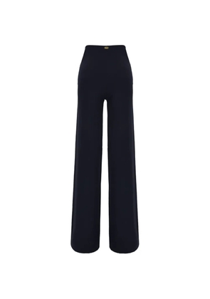 Maison Anami logo-plaque wide-leg trousers - Blue