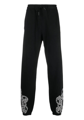 COUNTY OF MILAN logo-print organic-cotton track pants - Black