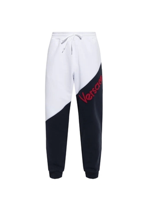 Versace logo-embroidered panelled track pants - Blue