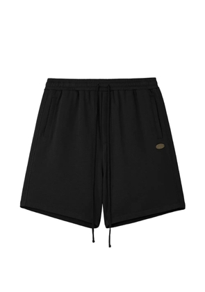 aftermaths drawstring-waist logo-patch shorts - Black