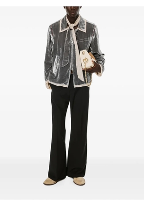 MASU pressed-crease flared trousers - Black