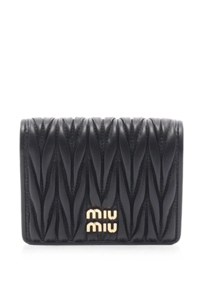 Miu Miu Pre-Owned 2020s Matelassé bi-fold wallet - Black