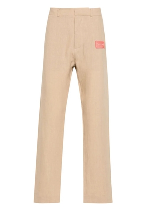 Off-White appliqué-logo tapered trousers - Neutrals