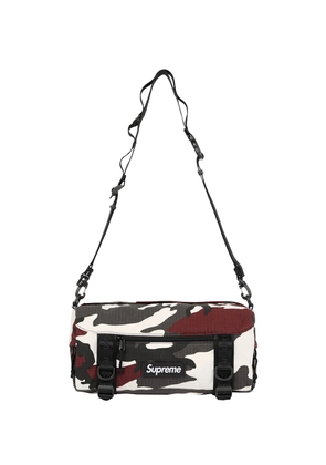 Supreme camouflage-print ripstop-texture messenger bag - Red
