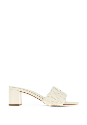 Miu Miu matelassé logo-plaque mules - Neutrals