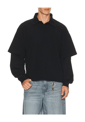AGOLDE Curren Double Sleeve Polo in Black. Size S. Also in M, L, XL/1X.