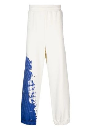 A-COLD-WALL* brush stroke-print track pants - Neutrals