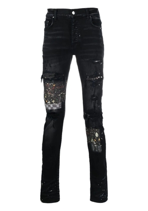 AMIRI paint-splatter patched jeans - Black