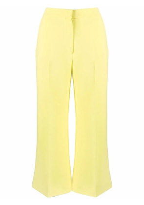 PUCCI pressed-crease flared trousers - Yellow