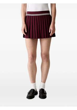 Sporty & Rich Abigail pleated logo-embroidered mini skirt