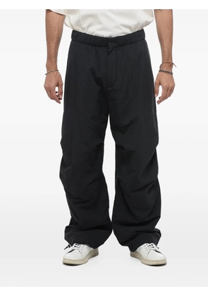 Studio Nicholson padded elasticated-waist trousers - Blue