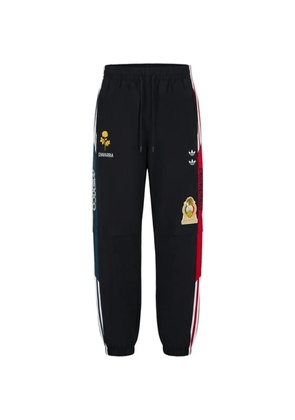 Willy Chavarria CDM logo-patch track pants - Black