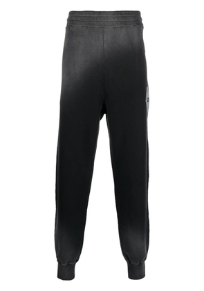 A-COLD-WALL* logo-print gradient-effect track pants - Black