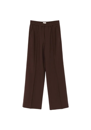 Closed elasticated-waistband pressed-crease trousers - Brown