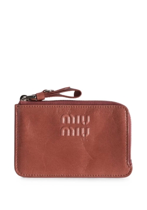Miu Miu embossed-logo leather card holder - Pink
