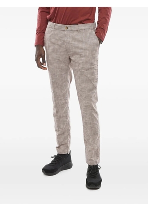 Cruna Newtown houndstooth-pattern trousers - Neutrals