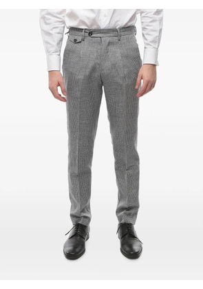 Cruna houndstooth-pattern trousers - White