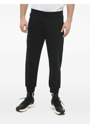 Neil Barrett Jumbled Bolts embroidered track pants - Black