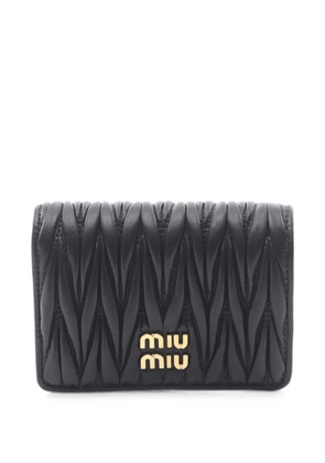 Miu Miu Pre-Owned 2020s Matelassé bi-fold wallet - Black