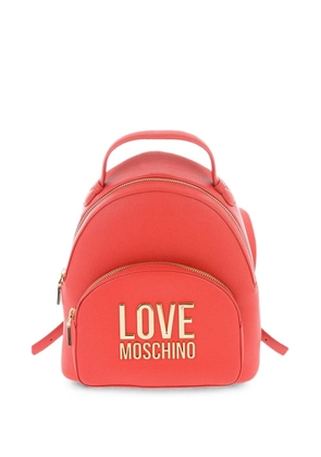 Moschino logo-plaque pebbled-effect backpack - Red