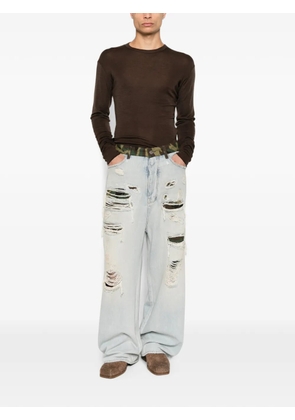 AMIRI distressed camouflage-print jeans - Blue