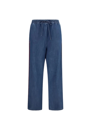 Valentino Garavani piped-trim VLogo jeans - Blue