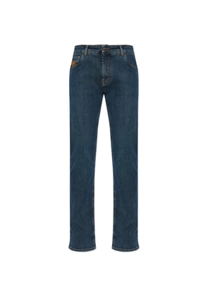 ETRO Pegaso-embroidered tapered jeans - Blue