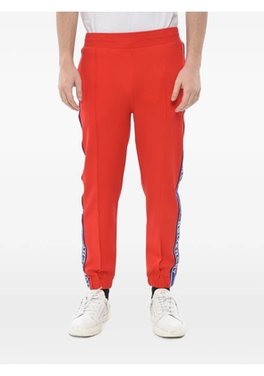 Givenchy logo-tape track pants - Red