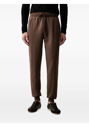 GUESS USA logo-tape track pants - Brown