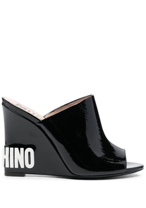 Moschino 110mm embossed-logo wedge sandals - Black