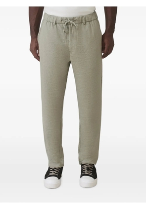 MAUVAIS drawstring-waist textured-finish trousers - Green