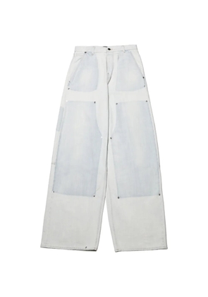 Haikure patchwork rivet-embellished jeans - Blue