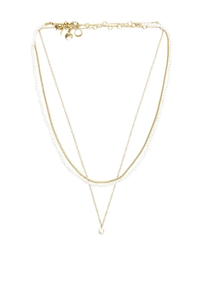BaubleBar Rue Waterproof Necklace Set in Metallic Gold.