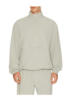 On Courtside 1/2 Zip Eaze in Tan. Size M. Also in XS, S, L, XL/1X, XXL/2X.