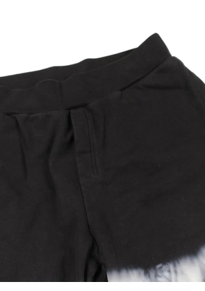 Christian Dior Pre-Owned 2020s tie-dye embroidered-detail track pants - Black