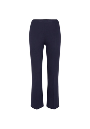 Liviana Conti pressed-crease flared trousers - Black
