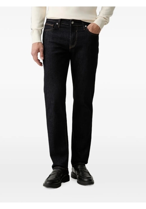 GUESS USA logo-patch straight-leg jeans - Blue