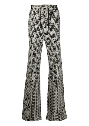 Balmain monogram-motif trousers - Neutrals
