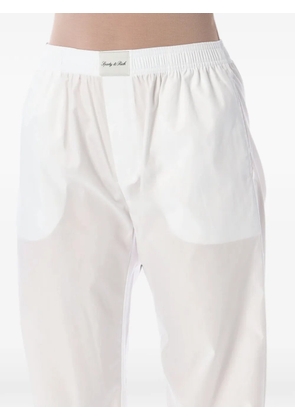 Sporty & Rich logo-patch straight-leg trousers - White